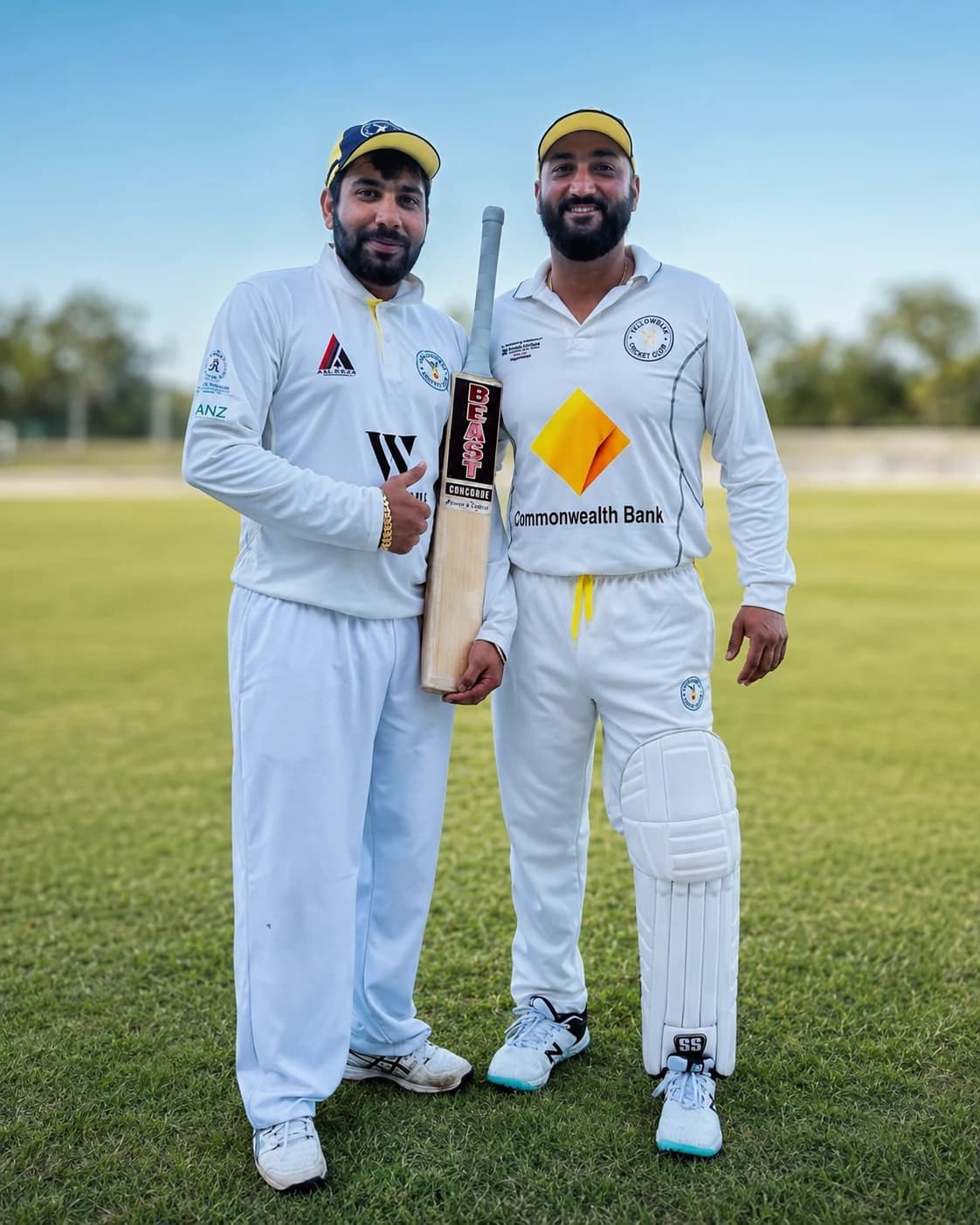 Two Willowdale senior cricket players together on the field