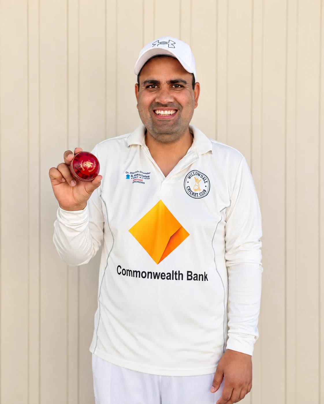 Willowdale senior player holding a cricket ball